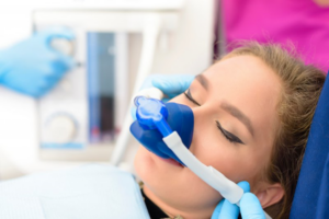 Woman relaxing while receiving laughing gas